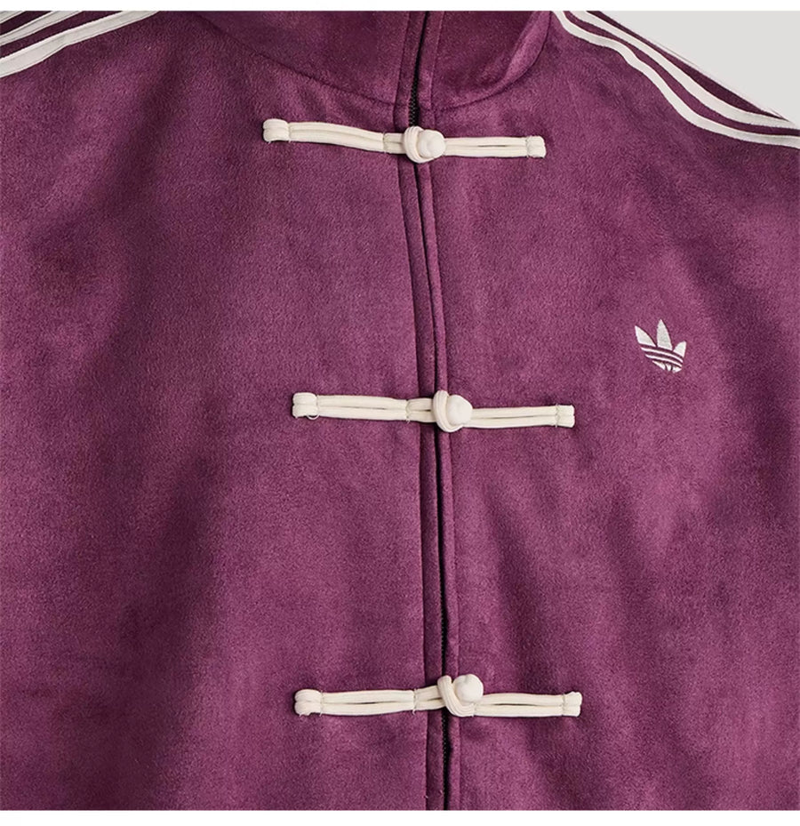 Peito da jaqueta Roxo com o trevo bordado